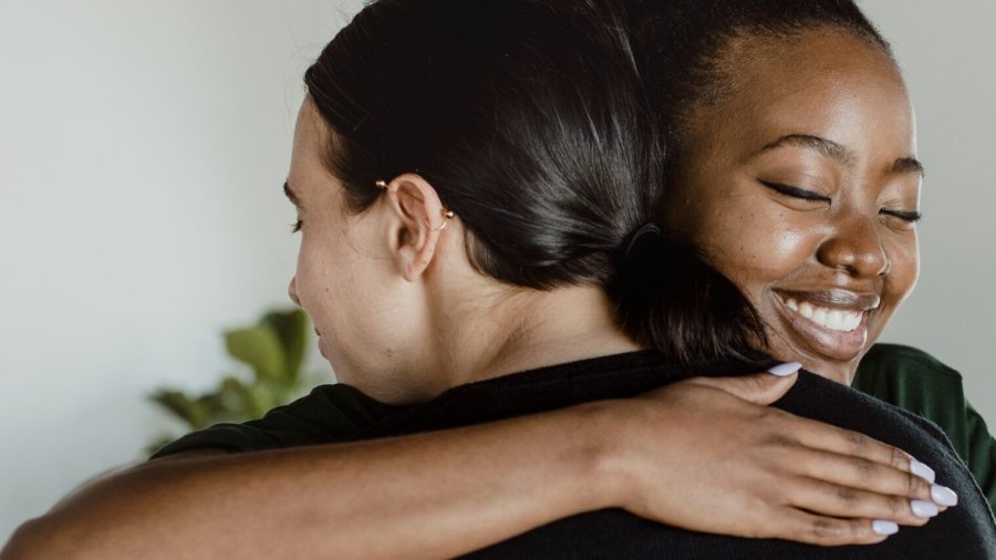 Diverse people in a supporting group session